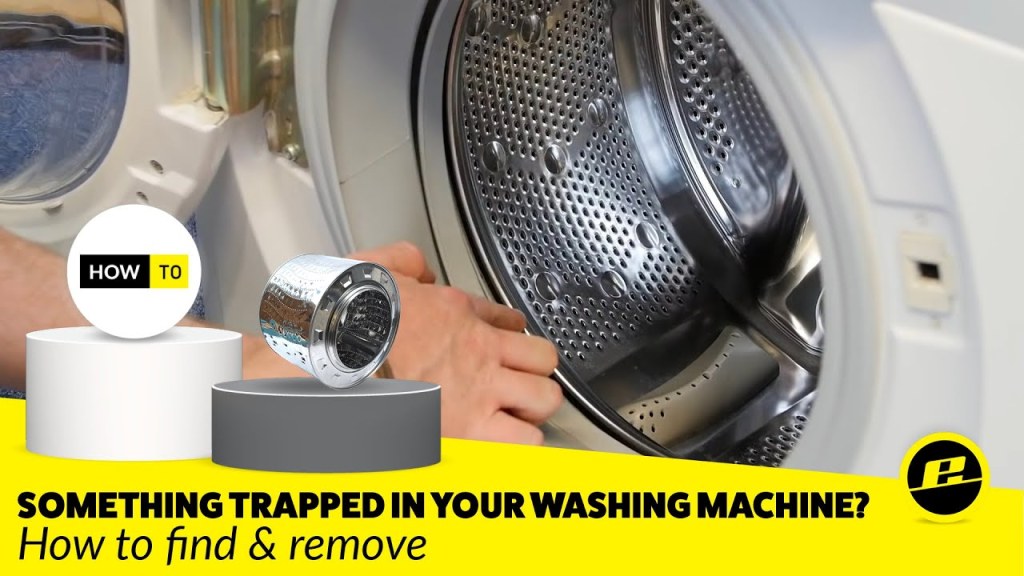 item stuck between inner and outer drum - How to Remove a Stuck item from a Washing Machine Drum